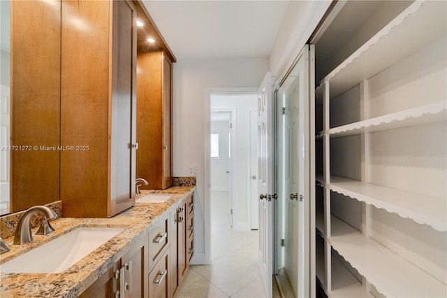 bathroom featuring vanity and tile patterned floors