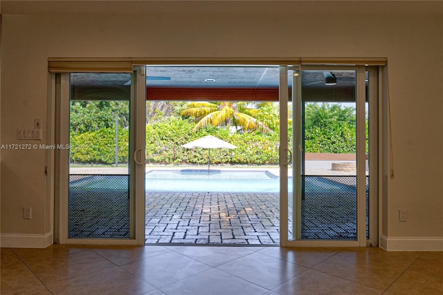 entryway featuring tile patterned floors and a wealth of natural light