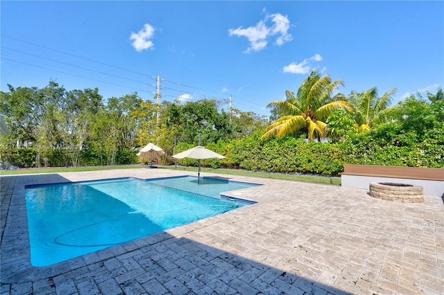 view of swimming pool featuring a patio area