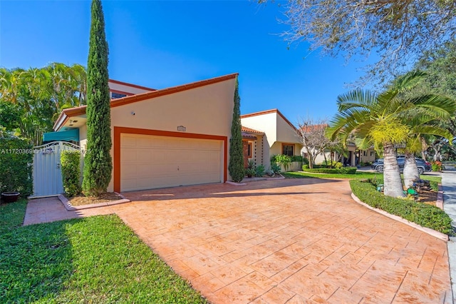 view of front of property with a garage