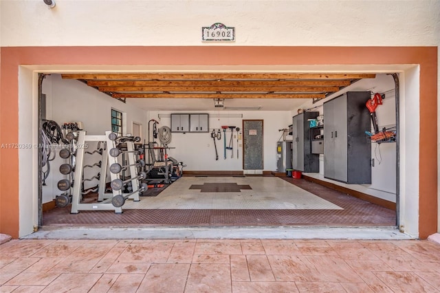 garage featuring electric water heater