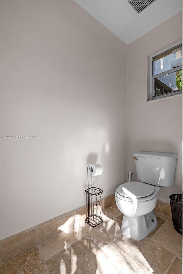 bathroom featuring toilet