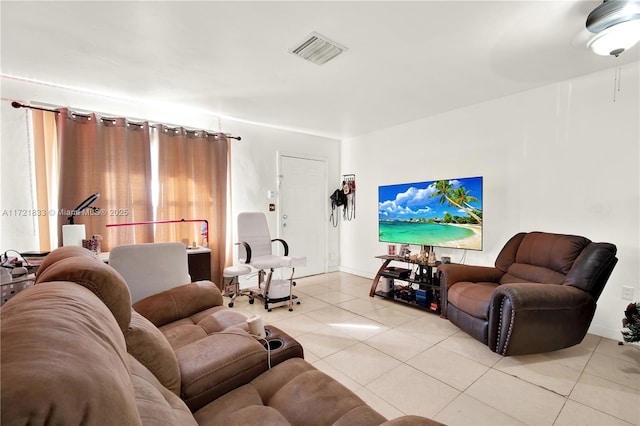 living room featuring light tile patterned flooring