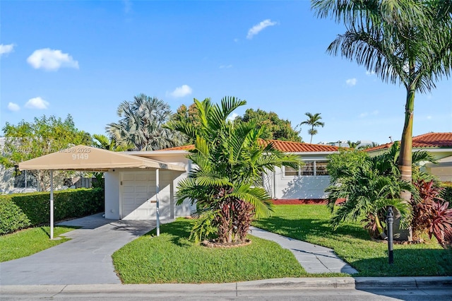 view of front facade with a front lawn and a garage