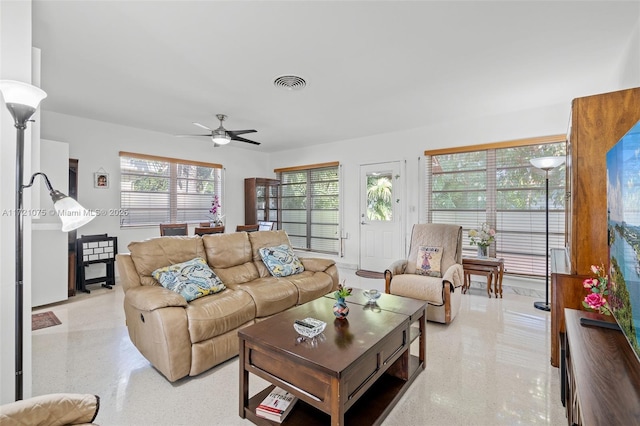 living room with ceiling fan