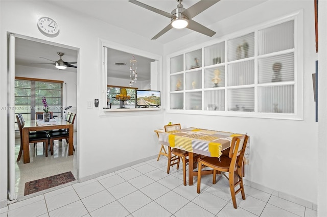 dining space with ceiling fan