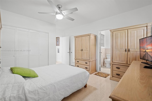 bedroom with connected bathroom, ceiling fan, and a closet