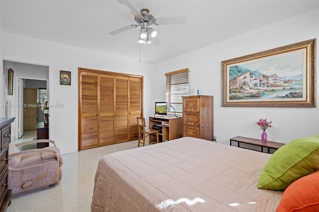 bedroom featuring a closet and ceiling fan