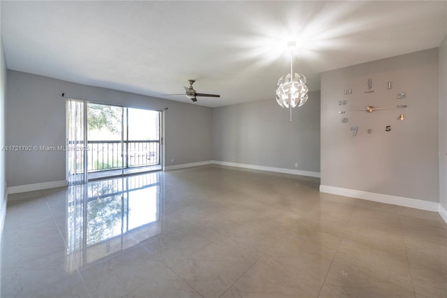 unfurnished room with ceiling fan