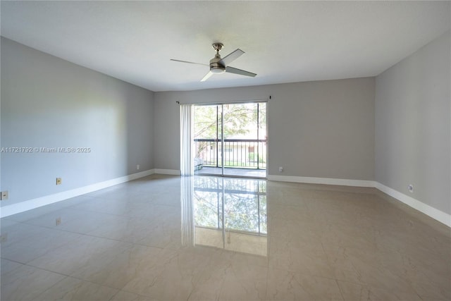 spare room featuring ceiling fan