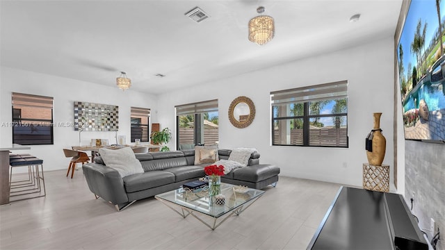 living room with light hardwood / wood-style flooring