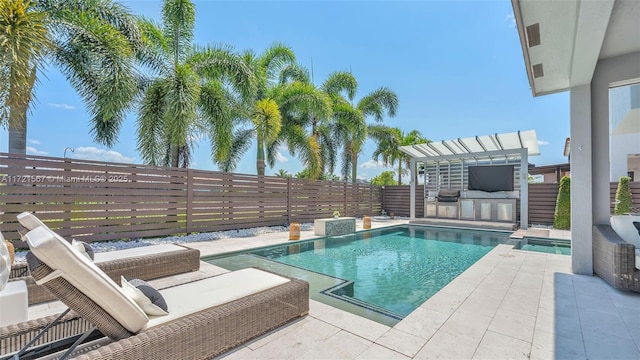 view of pool featuring area for grilling and a patio area