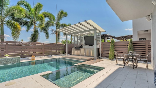 view of swimming pool with a pergola, area for grilling, a patio area, and an in ground hot tub