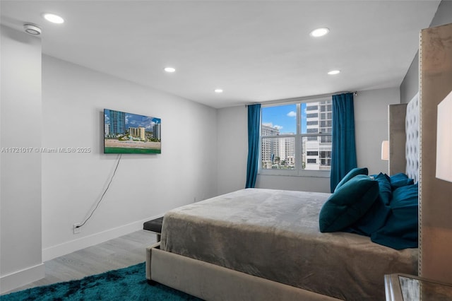 bedroom featuring hardwood / wood-style flooring