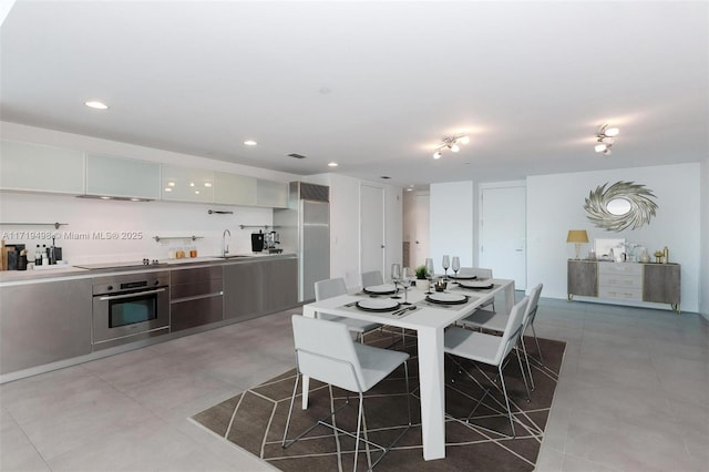 dining room featuring sink