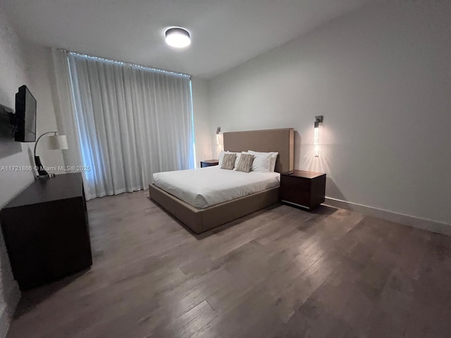 unfurnished bedroom with light wood-type flooring