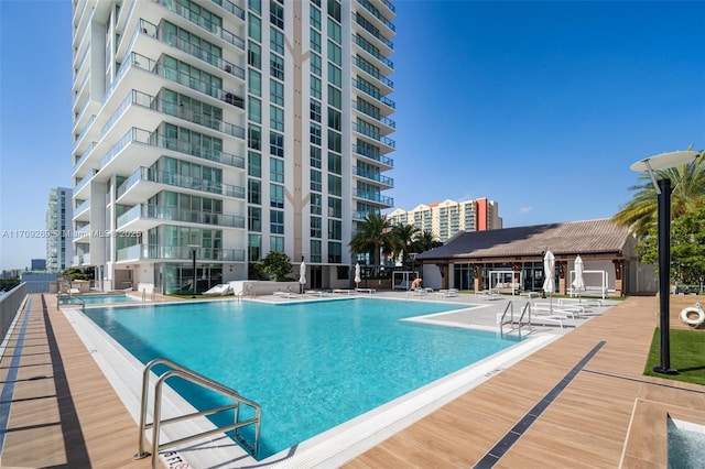 community pool with a patio