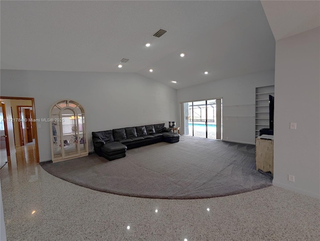 11340 SW 1st St, Coral Springs, FL 33071 - carpeted living room with visible vents, baseboards, and lofted ceiling