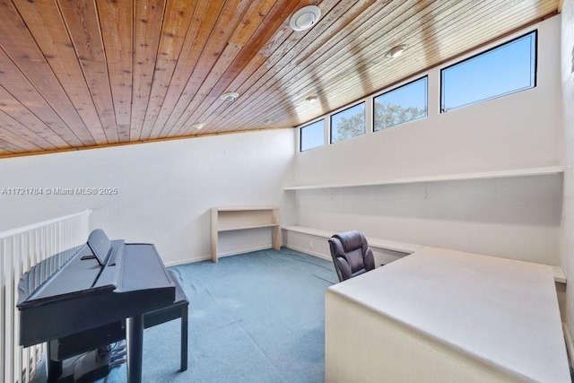 office area featuring vaulted ceiling, light carpet, and wooden ceiling