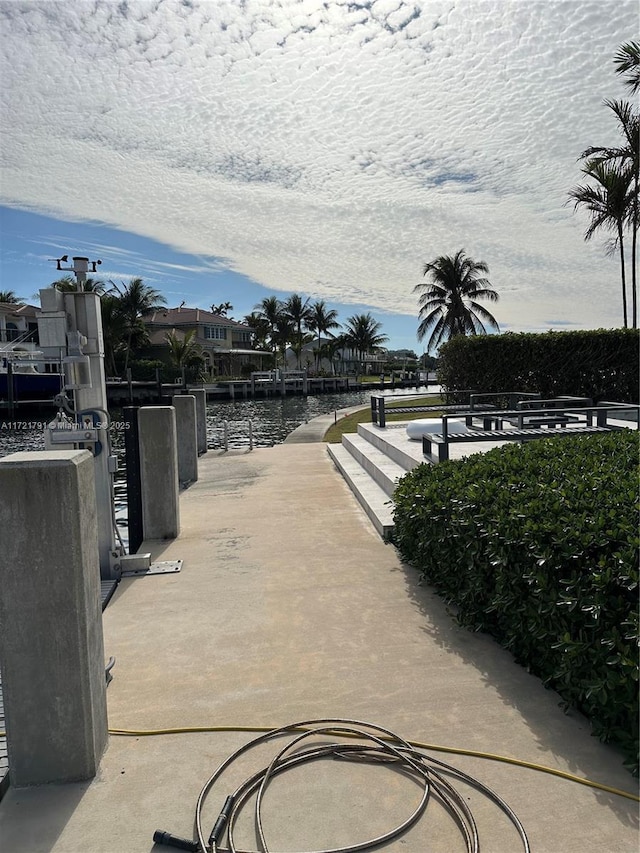 view of patio featuring a water view