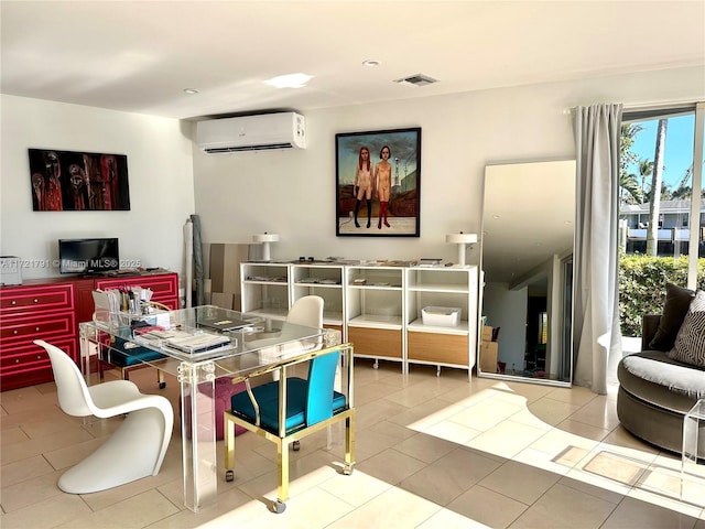 dining space with a wall mounted air conditioner and light tile patterned floors