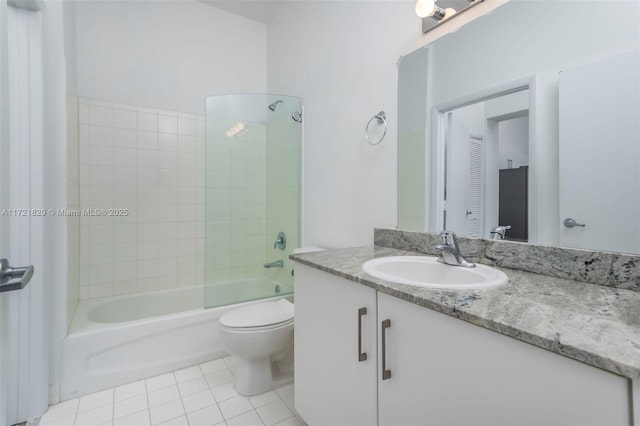 full bathroom featuring tile patterned floors, vanity, toilet, and bathtub / shower combination