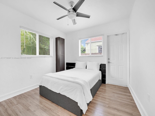 bedroom featuring ceiling fan and light wood-type flooring