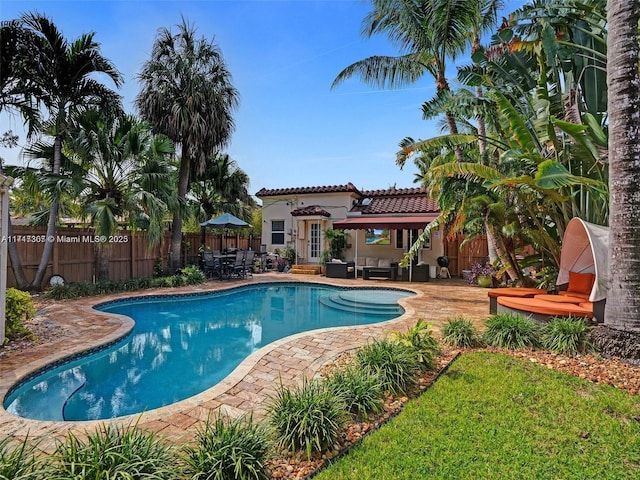 view of pool featuring a patio and an outdoor hangout area