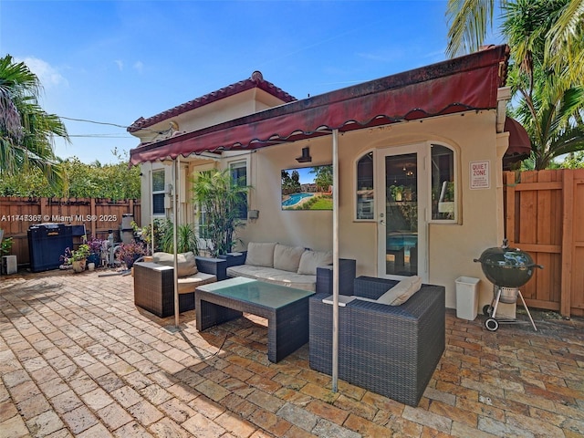 view of patio / terrace featuring outdoor lounge area and grilling area