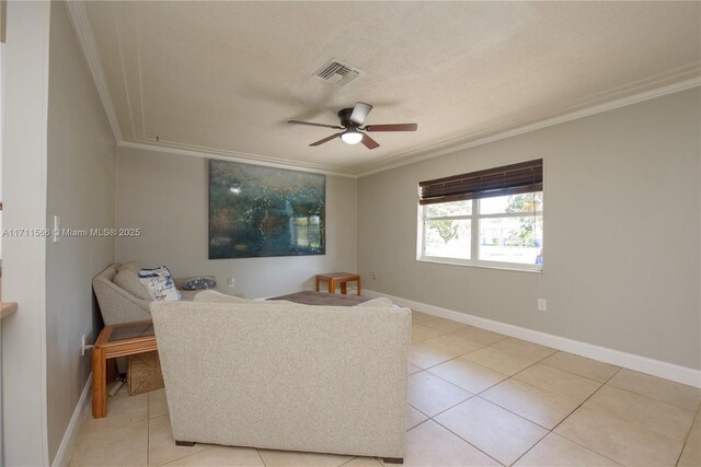 bedroom with light tile patterned floors, a textured ceiling, and ceiling fan