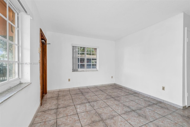 view of tiled spare room