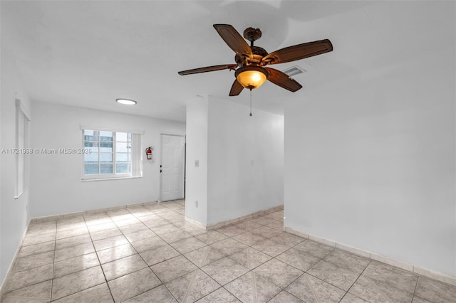 unfurnished room with ceiling fan