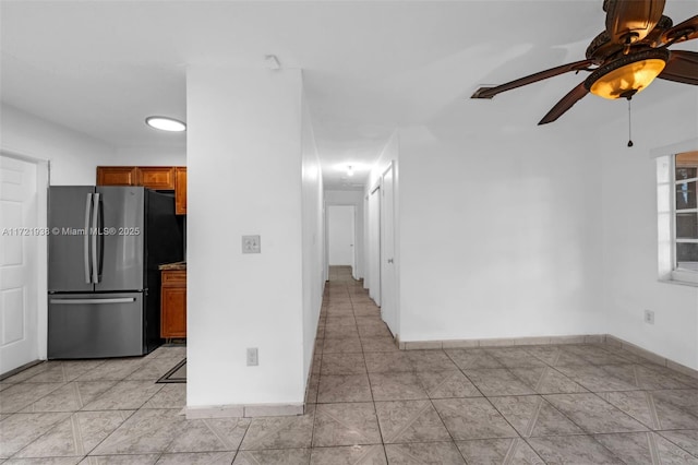 unfurnished room featuring ceiling fan