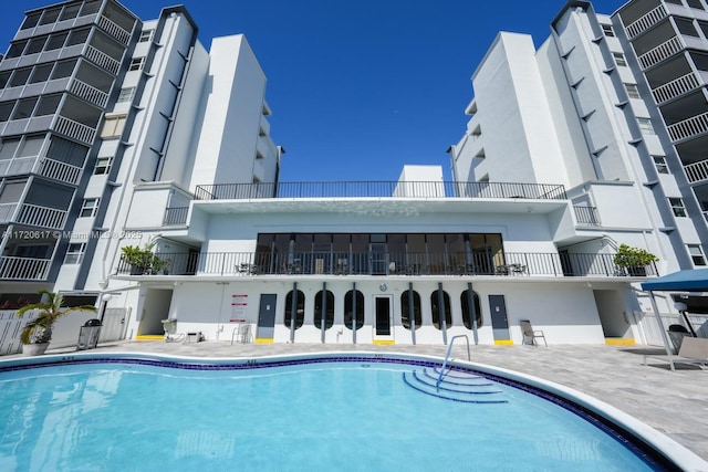 view of pool with a patio area