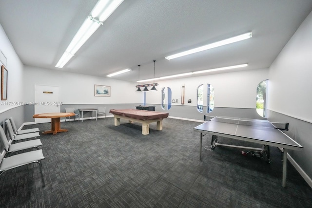 recreation room featuring dark colored carpet, baseboards, and pool table