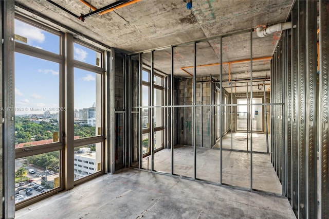 interior space featuring concrete flooring