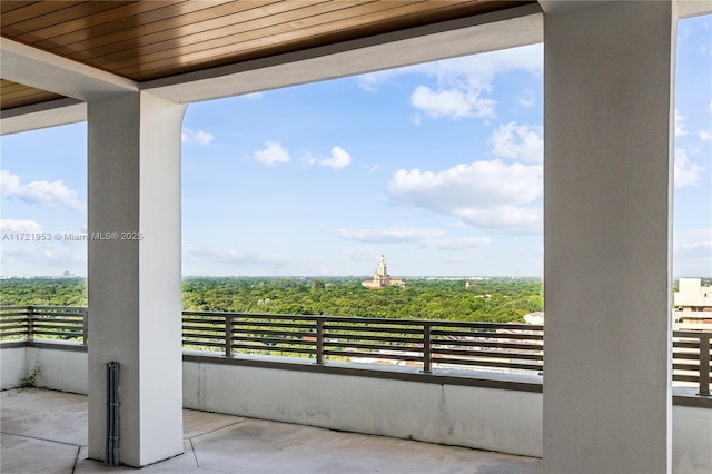 view of patio with a balcony