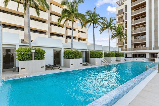 view of swimming pool with a patio