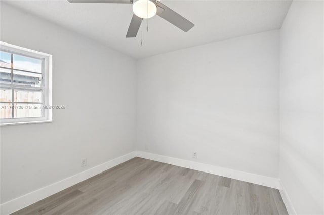 unfurnished room featuring ceiling fan and light hardwood / wood-style flooring