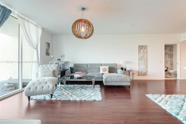 living room featuring dark wood-type flooring