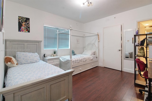 bedroom featuring dark wood-type flooring