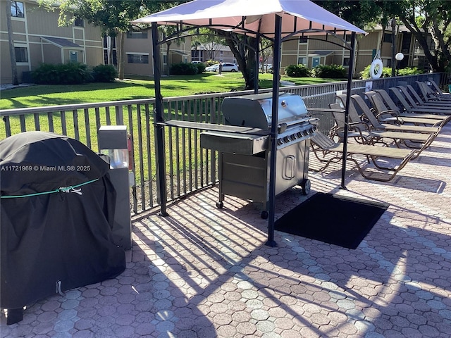 view of patio / terrace featuring a gazebo and grilling area