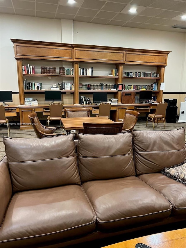 interior space with hardwood / wood-style floors and built in desk