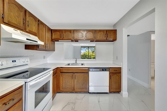 kitchen with white appliances and sink