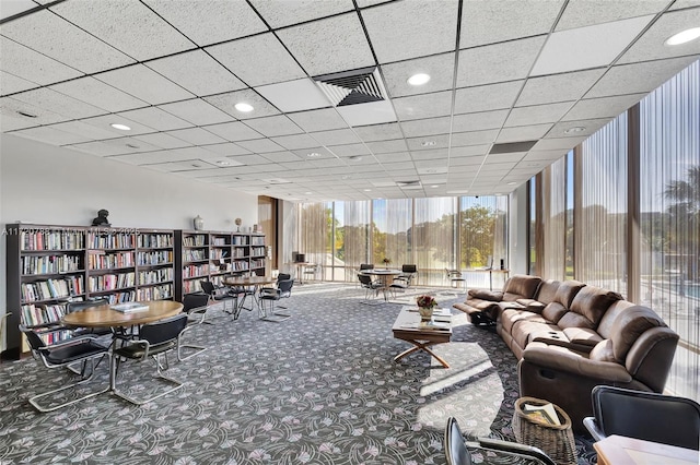 interior space with a wall of windows