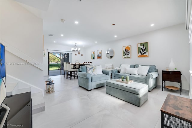 living room with a notable chandelier