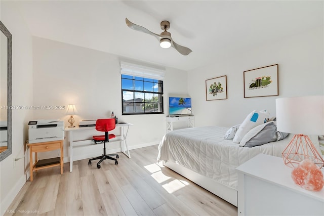 bedroom with ceiling fan and light wood-type flooring