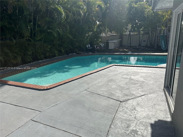 10331 SW 135th Ct, Miami, FL 33186 - view of pool featuring a patio area