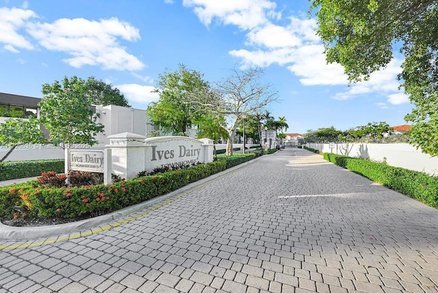 view of street with curbs