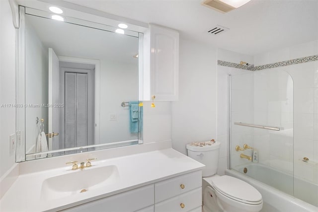 full bathroom with vanity, shower / bath combination, and toilet